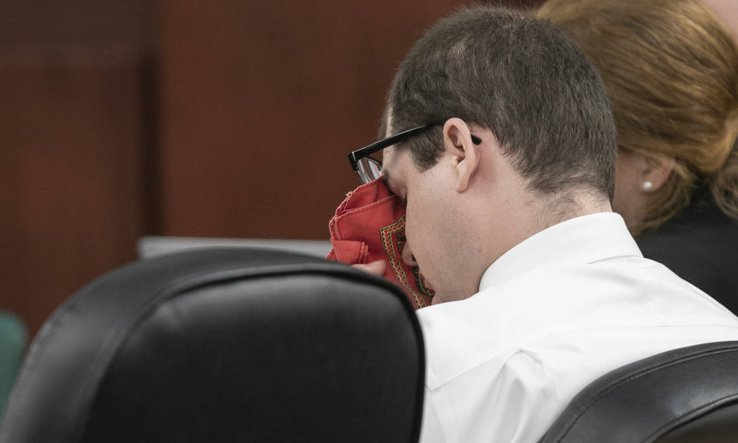 Timothy Jones Jr. wipes his eyes as his ex-wife Amber Kyzer, mother of five children who were k ...