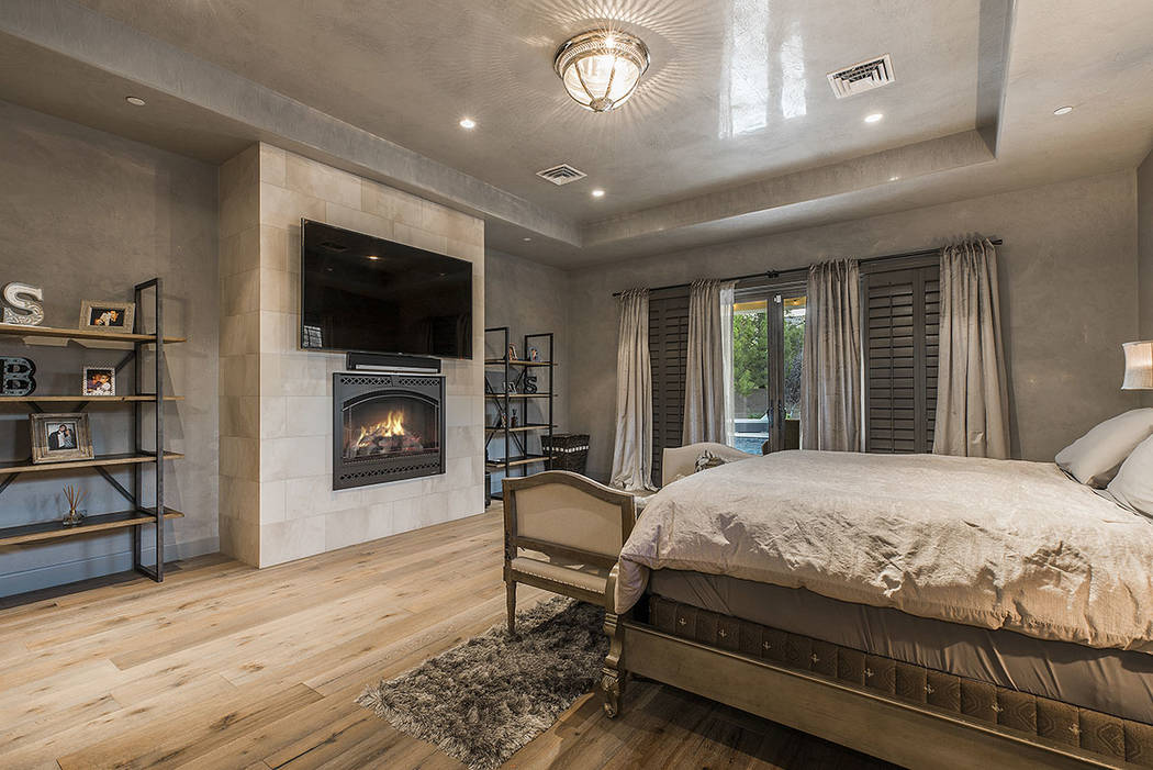 The master bedroom features a fireplace. (Ivan Sher Group)