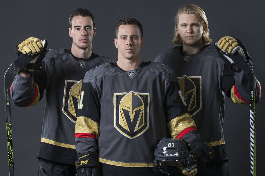 Golden Knights right wing Reilly Smith, left, center Jonathan Marchessault and center William K ...