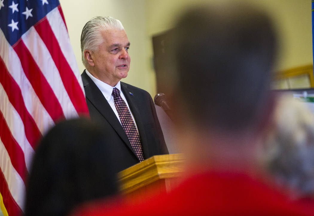 Gov. Steve Sisolak speaks before signing a trio of bills, including AB291, which includes a var ...