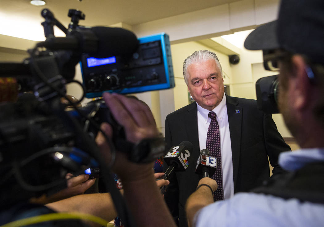 Gov. Steve Sisolak speaks after signing a trio of bills, including AB291, which includes a vari ...