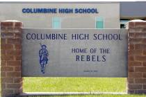 Signs outside Columbine High School are photographed, Thursday, June 13, 2019, in Littleton, Co ...