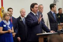 Florida Governor Ron DeSantis addresses the audience before he signs the Sanctuary City bill at ...