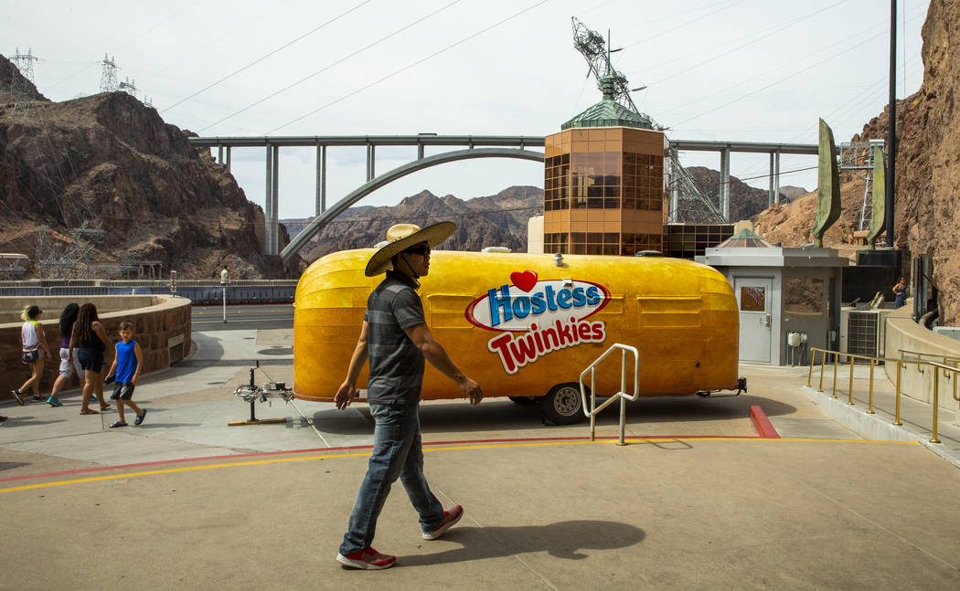 Visitor Liem Phung of Vietnam wanders about the Twinkiemobile which makes a stop at the Hoover ...