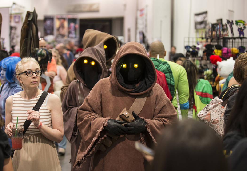 Characters inspired by the " Star Wars" series walk the North Halls during the Amazin ...