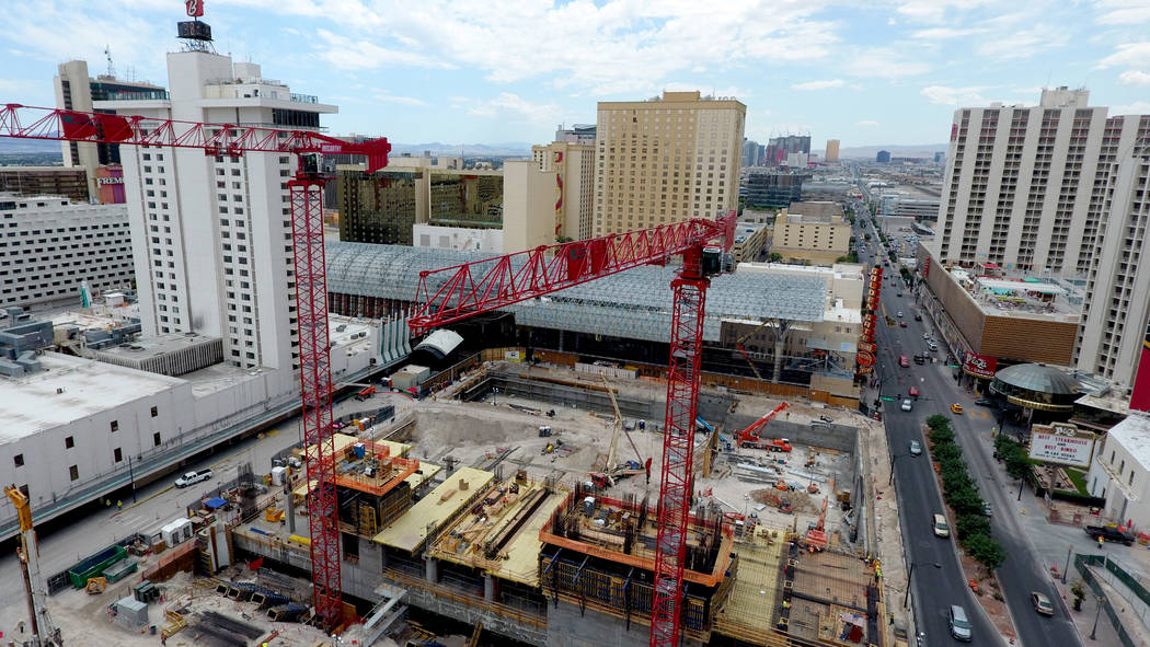 Two cranes tower over the Circa hotel casino construction site on the edge of the Fremont Stree ...