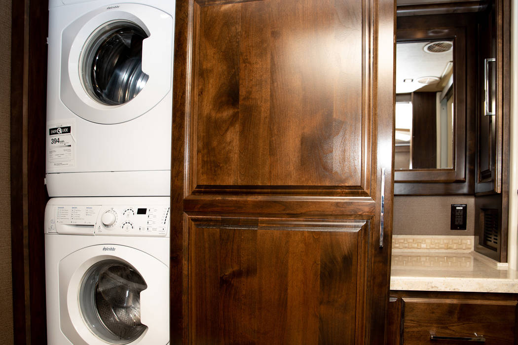 A sliding door in the master bath reveals a stackable washer and dryer. (Tonya Harvey/PBTH)