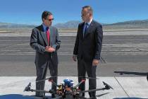 President of Poland Andrzej Duda, right, and Chris Walach, executive director the Nevada Instit ...