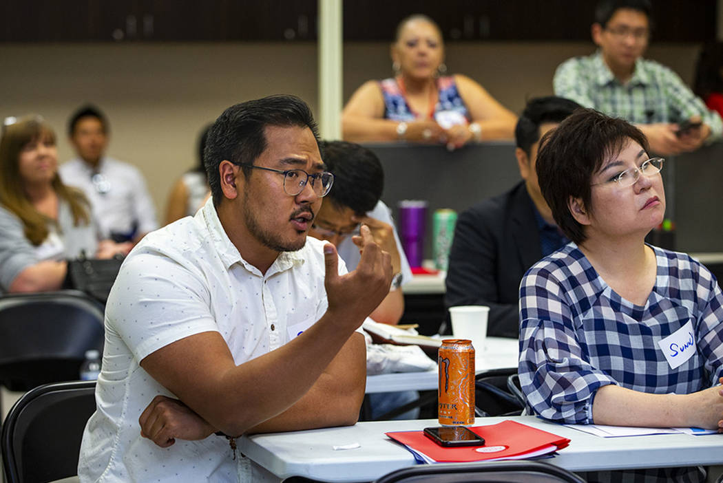 Phil Kim asks a question of U.S. Rep. Steven Horsford, D-Nev., speaking before volunteers durin ...