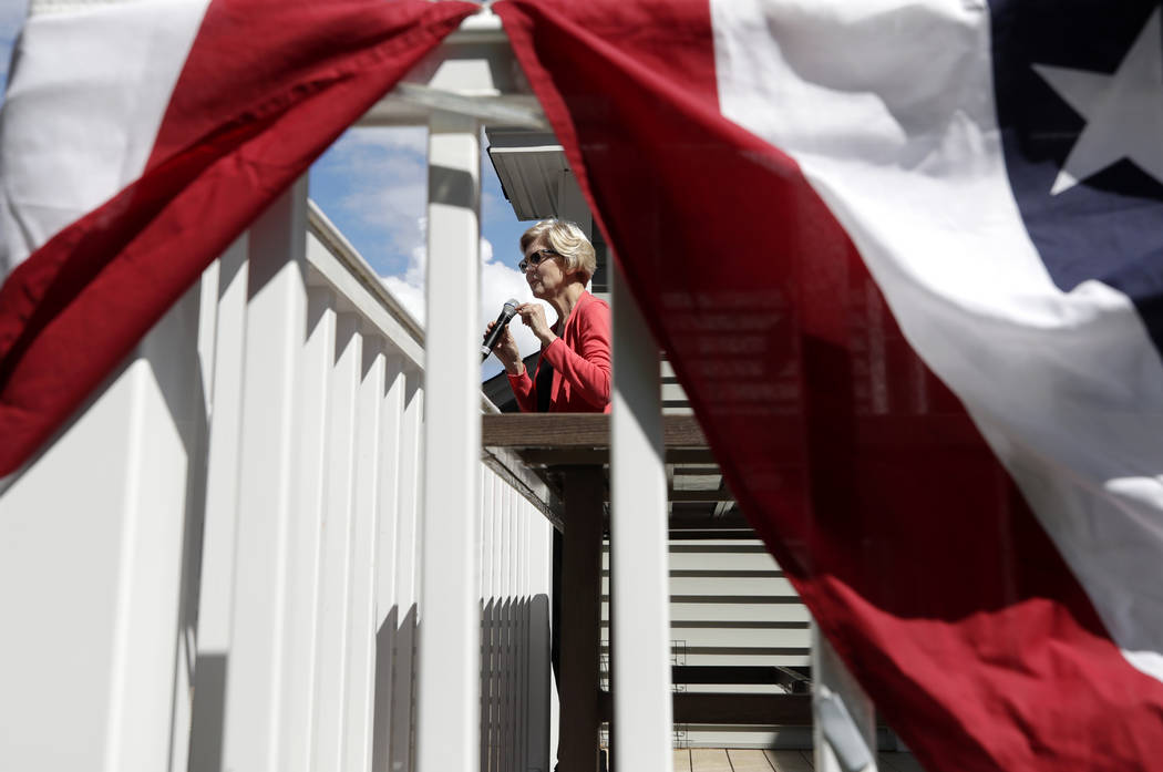 Democratic presidential candidate Sen. Elizabeth Warren, D-Mass., speaks at a campaign house pa ...
