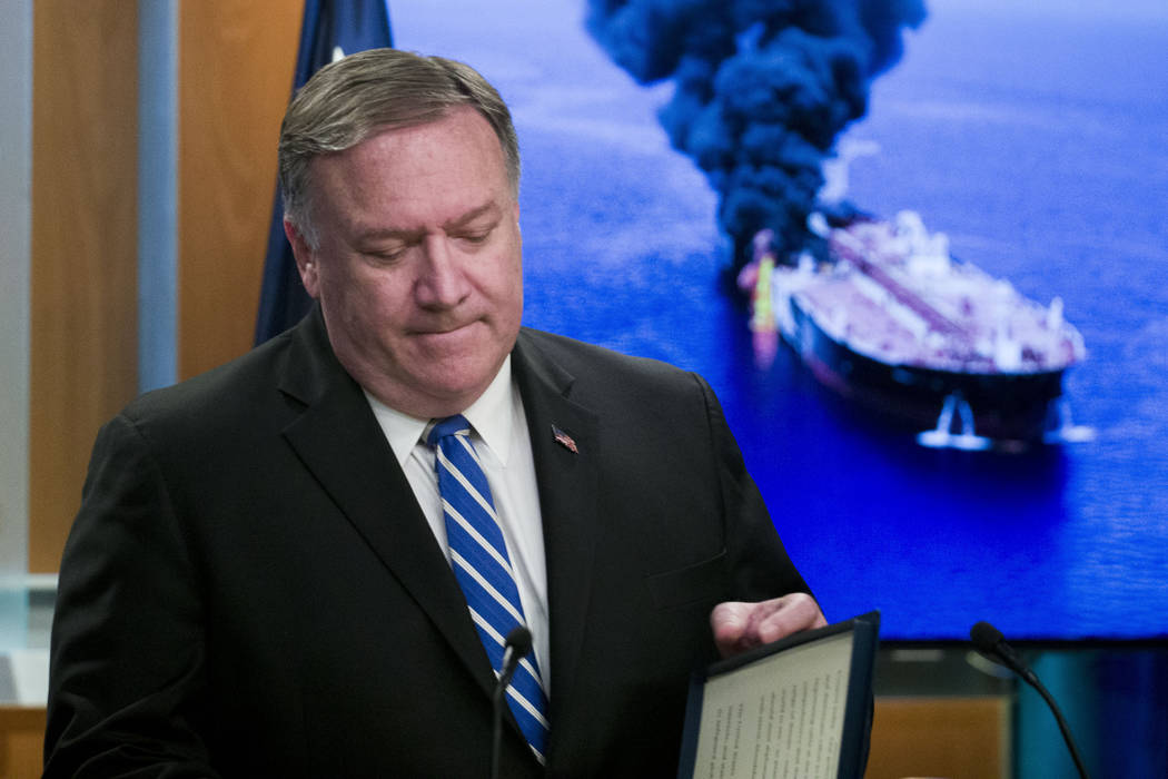 Secretary of State Mike Pompeo closes his remarks as he departs after a media availability, at ...
