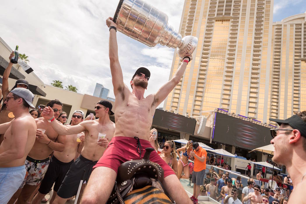 Robert Bortuzzo of the St. Louis Blues is shown with the Stanley Cup at Wet Republic at MGM Gra ...