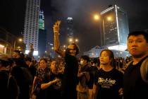 Protesters gather into the night against an unpopular extradition bill in Hong Kong on Sunday, ...