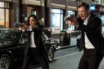 This image released by Sony Pictures shows Tessa Thompson and Chris Hemsworth in a scene from C ...