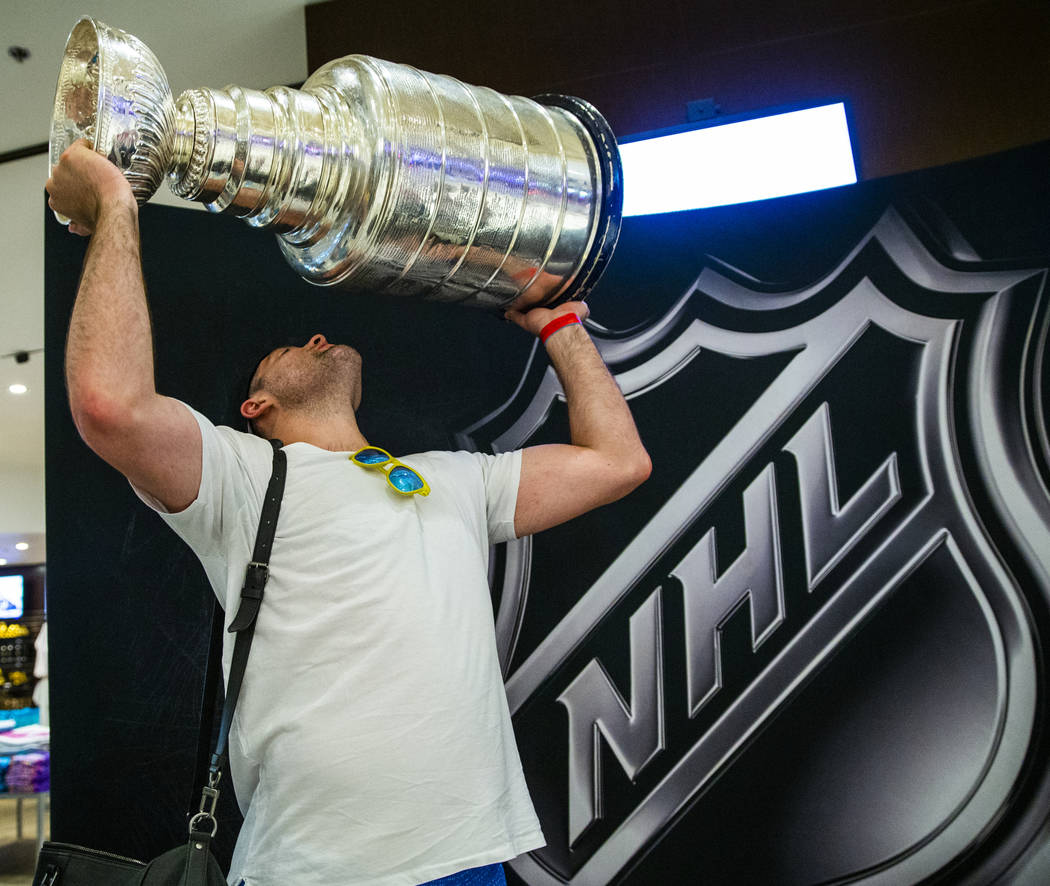 St. Louis Blues left wing Patrick Maroon lifts the Stanley Cup, the most recognizable and rever ...