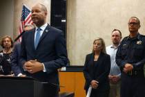 Nevada Attorney General Aaron Ford, left, speaking during a press conference at Reno City Hall ...