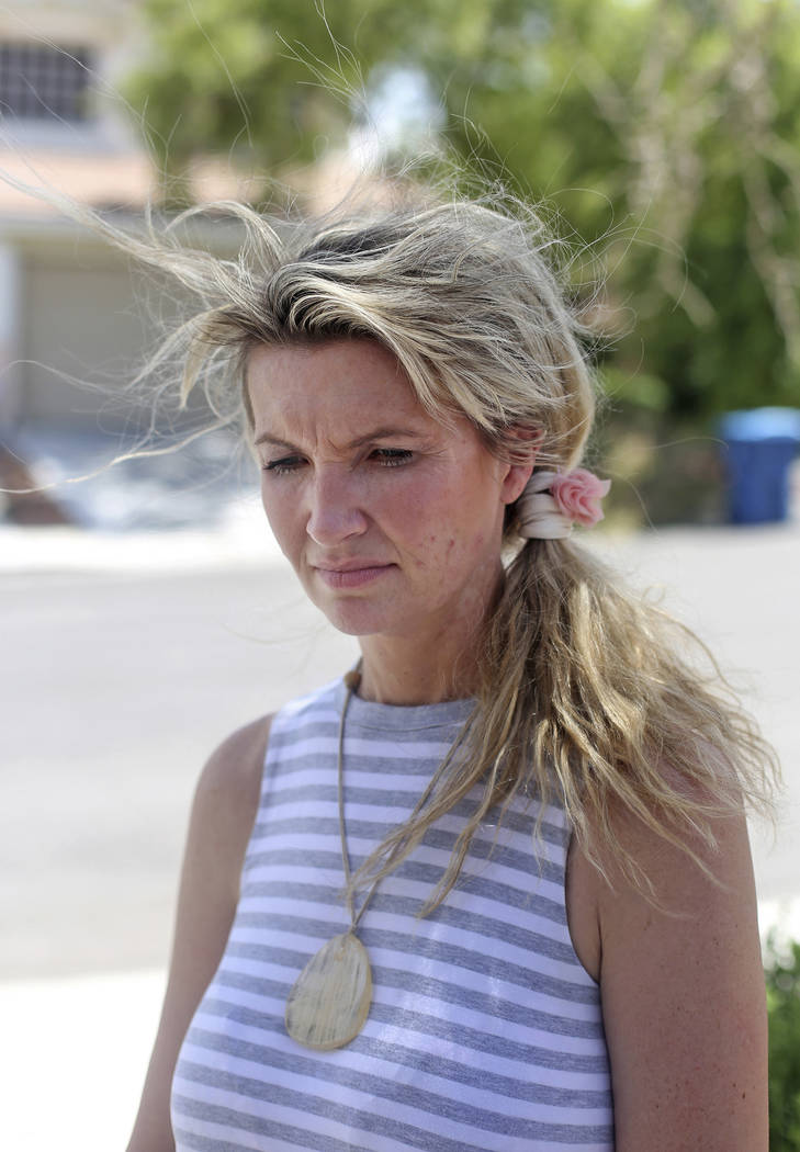 Kari Monson outside her former home in Las Vegas, Monday, Aug. 20, 2018. She was evicted after ...