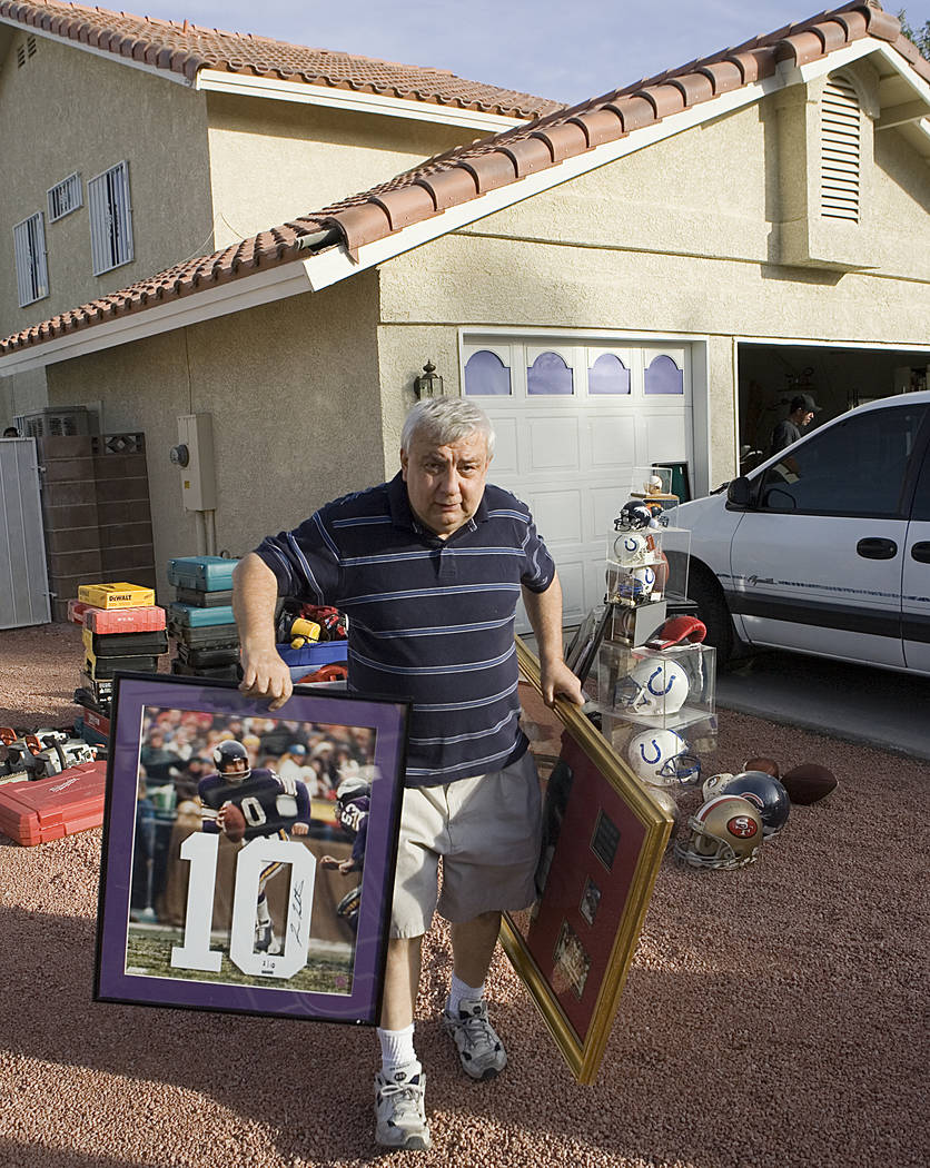 Rick Nara, owner of Play Ball, a sports card and sports memorabilia shop on Spring Mountain Roa ...