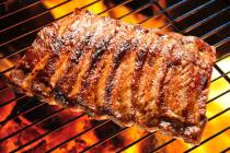 Grilled pork ribs on the grill. (Getty Images)