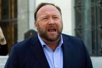 In a Sept. 5, 2018, file photo, Alex Jones speaks to reporters in Washington. Lawyers in Connec ...