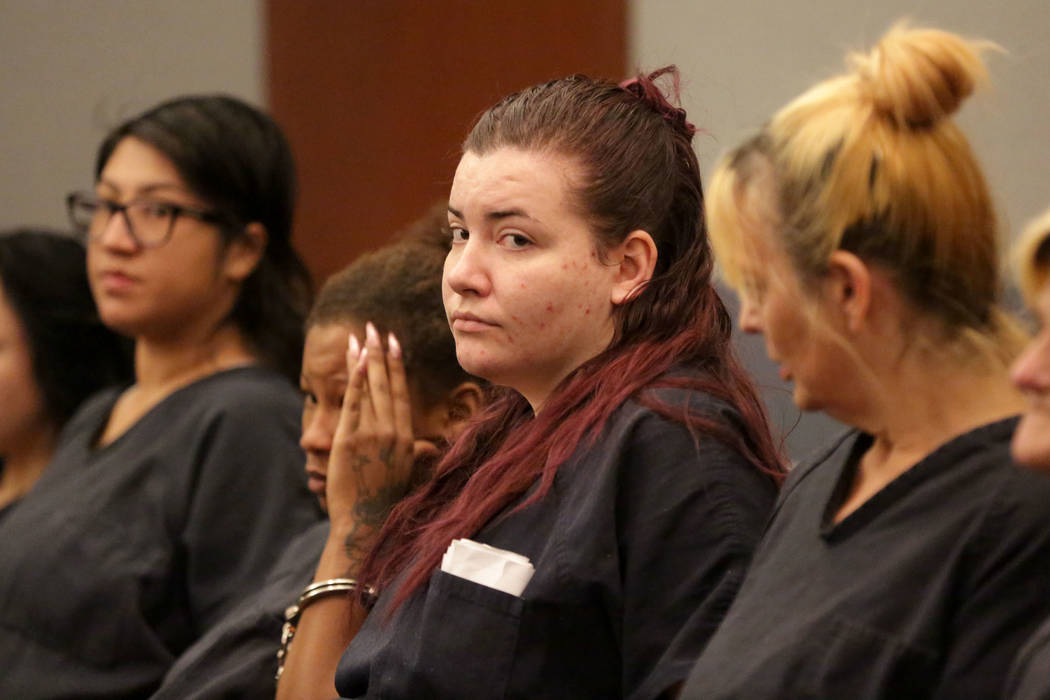 Diana Pena, center, one of three suspects in the killing of a California doctor, appears in cou ...