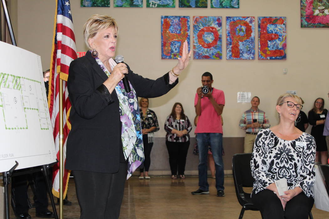 Las Vegas Mayor Carolyn, left, speaks during a community partner breakfast at the Las Vegas Res ...