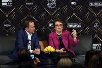 The National Hockey League commissioner Gary Bettman, left, listens as tennis icon Billie Jean ...