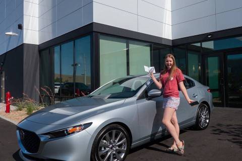 Green Valley High School student Molly Martin is seen with her 2019 Mazda3 purchased from Findl ...