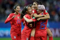 United States' Alex Morgan, second right, celebrates after scoring her side's 12th goal during ...
