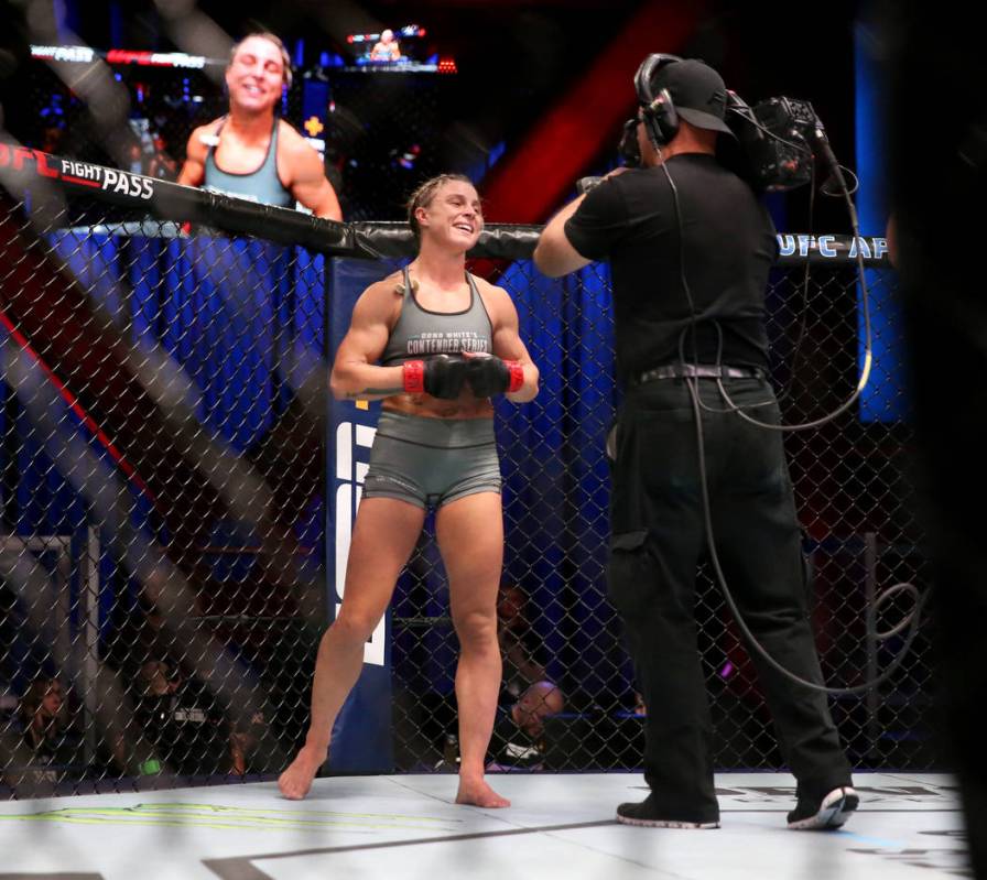 Hannah Goldy reacts after fighting Kali Robbins in their strawweight bout on the opening week o ...