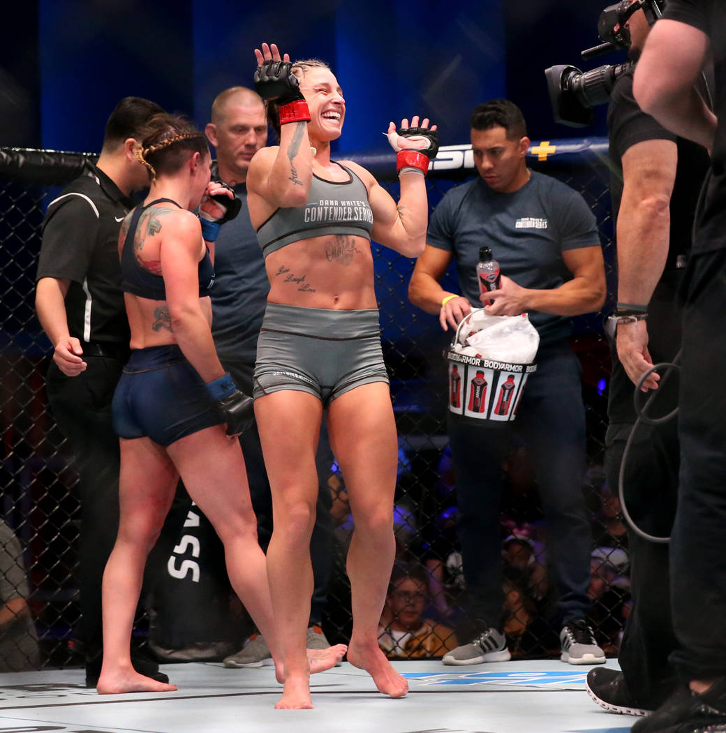 Hannah Goldy reacts after fighting Kali Robbins in their strawweight bout on the opening week o ...