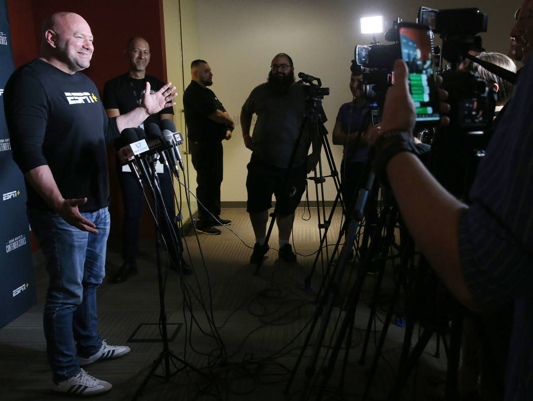 Ultimate Fighting Championship president Dana White talks to the news media about the opening w ...