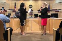 Henderson City Councilwoman Michelle Romero, right, representing Ward 1, recites her oath of of ...