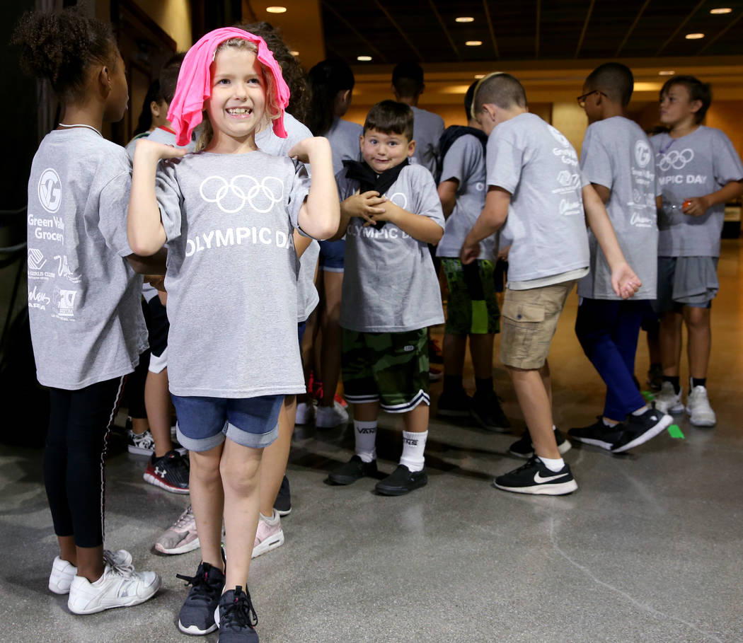Braelynn Schoen, 8, of Southern Highlands Boys & Girls Club, prepares for Olympic Day at The Or ...