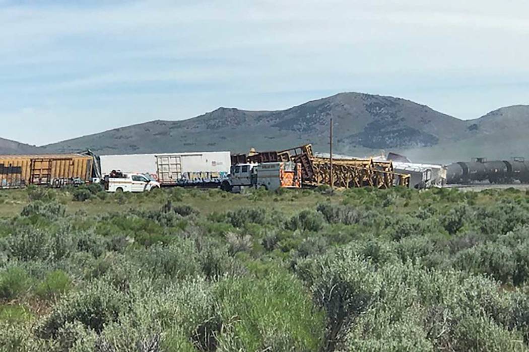 A train carrying ammunition, grenades and vegetable oil derailed Wednesday morning, June 19, 20 ...