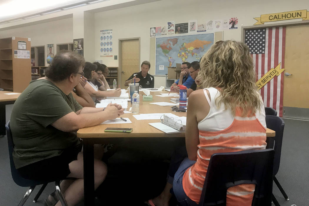 Principal James Kuzma briefs the school organizational team at Rancho High School in Las Vegas ...