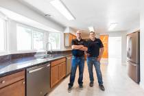 Pardee Homes Justin Zaricki, left, and Freddy Gonzales in the newly remodeled kitchen at Living ...