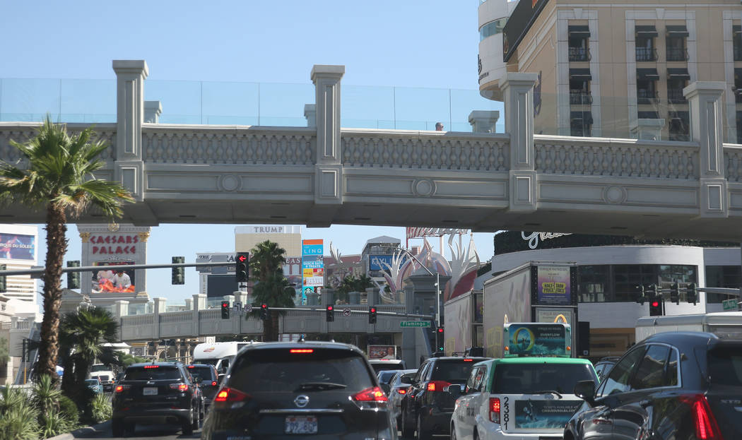 A pedestrian bridge is seen near the Bellagio on Thursday, June 20, 2019, in Las Vegas. A man w ...