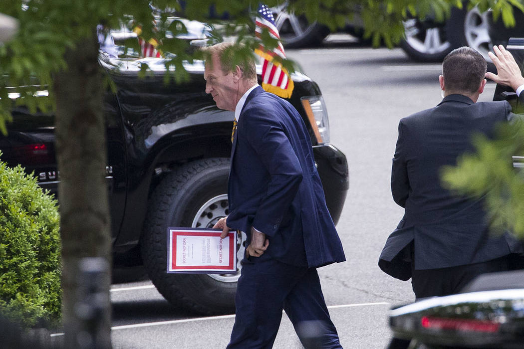 Outgoing acting Defense Secretary Patrick Shanahan arrives for a meeting with President Donald ...