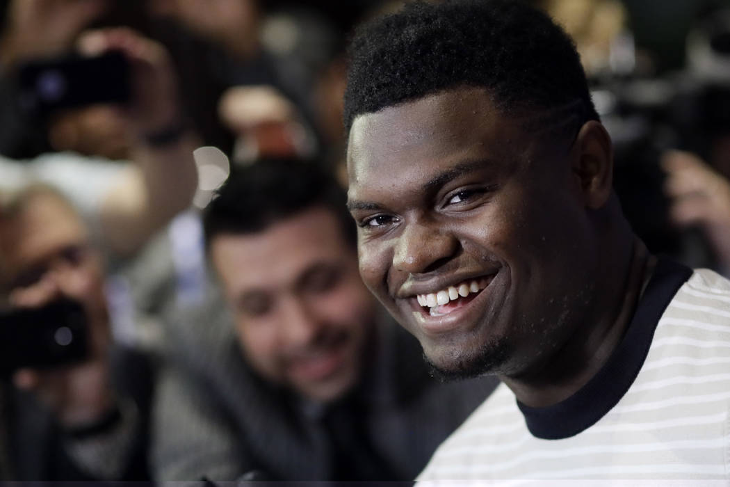 Zion Williamson, a freshman from Duke, attends the NBA Draft media availability, Wednesday, Jun ...