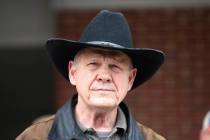 FILE - In this Dec. 12, 2017, file photo, Roy Moore speaks to the media after he rode in on a h ...