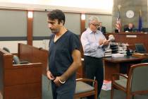 Slobodan Miljus, 37, left, accused of using a baseball bat to kill his wife of 17 years, leaves ...