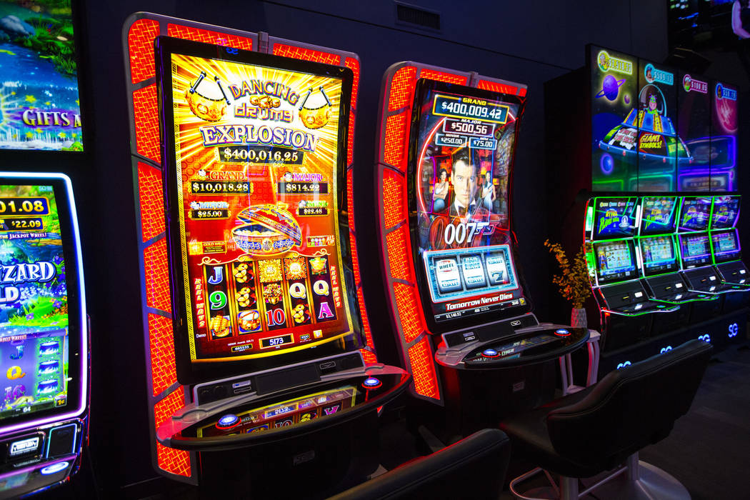 TwinStar slot cabinets with a curved 75" display and 4K resolution at the Scientific Games ...