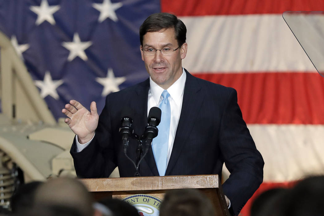 In a April 15, 2019, file photo, Secretary of the Army Mark Esper speaks to soldiers and family ...