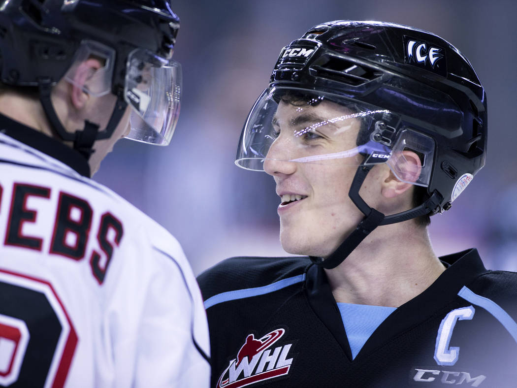 WHL (Western Hockey League) profile photo on Kootenay Ice player Peyton Krebs, right, chatting ...