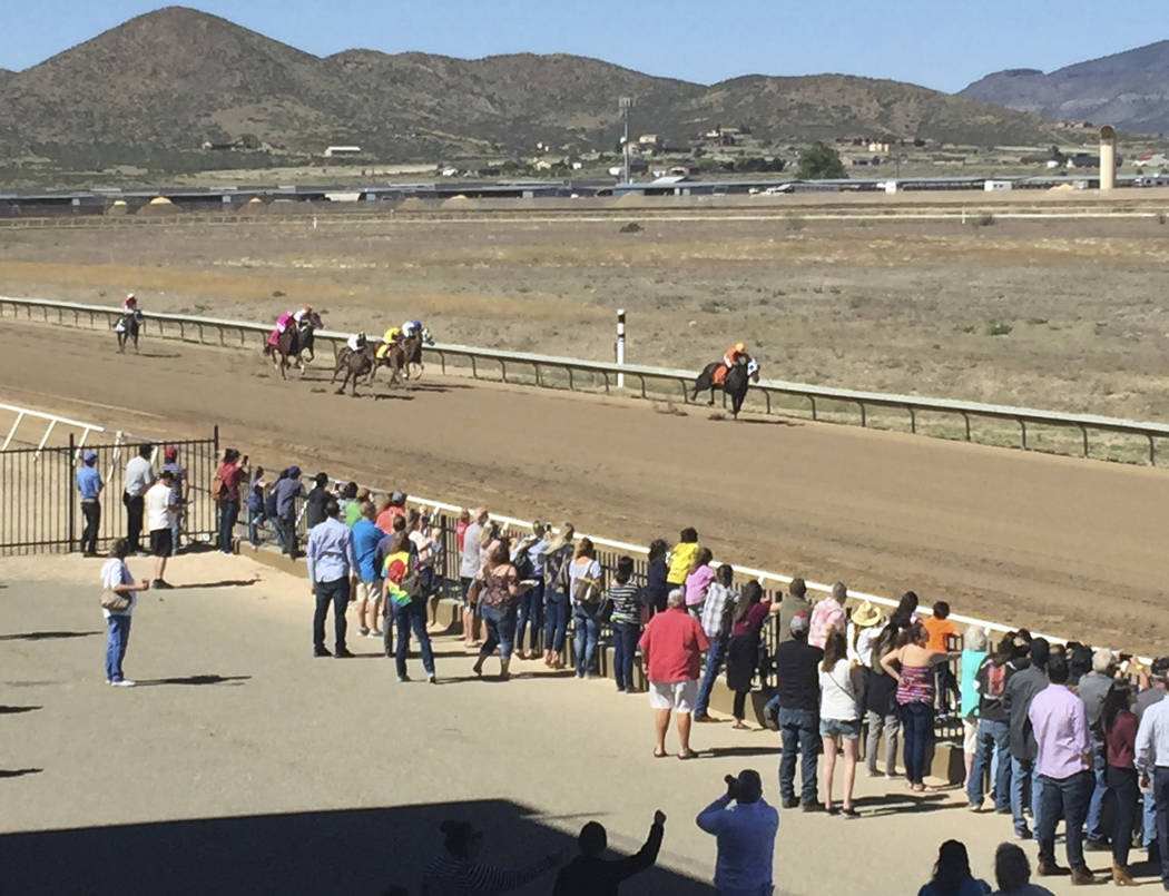 Horses race down the track at Arizona Downs in Prescott Valley, AZ, May 25, 2019. (Mike Brunker ...