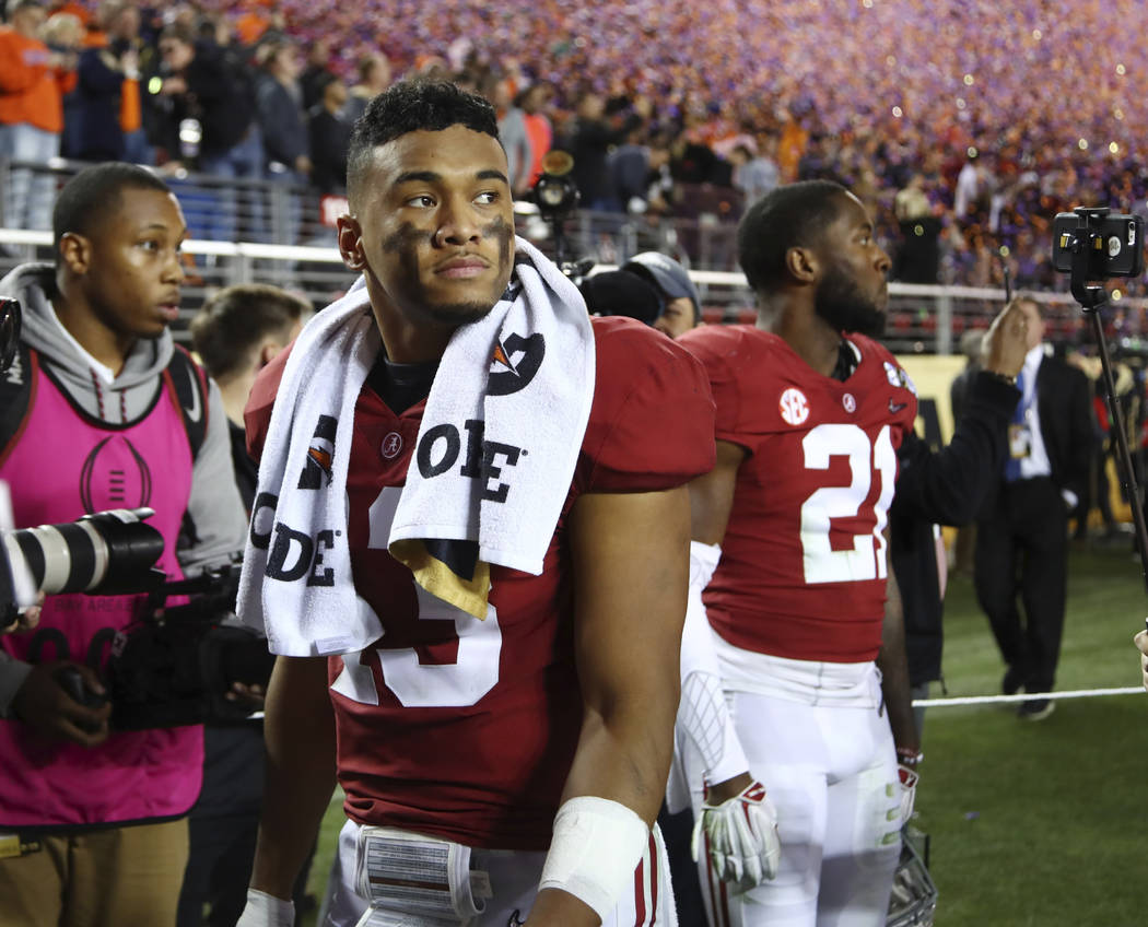 Alabama's Tua Tagovailoa reacts after the NCAA college football playoff championship game again ...