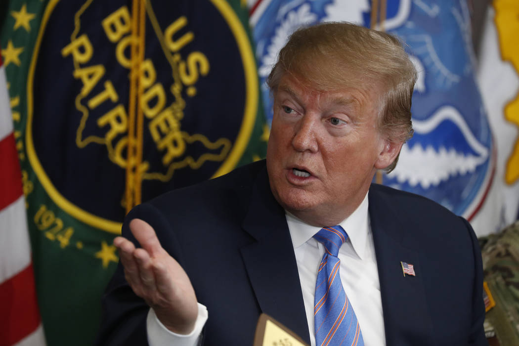 In this April 5, 2019 photo, President Donald Trump participates in a roundtable on immigration ...