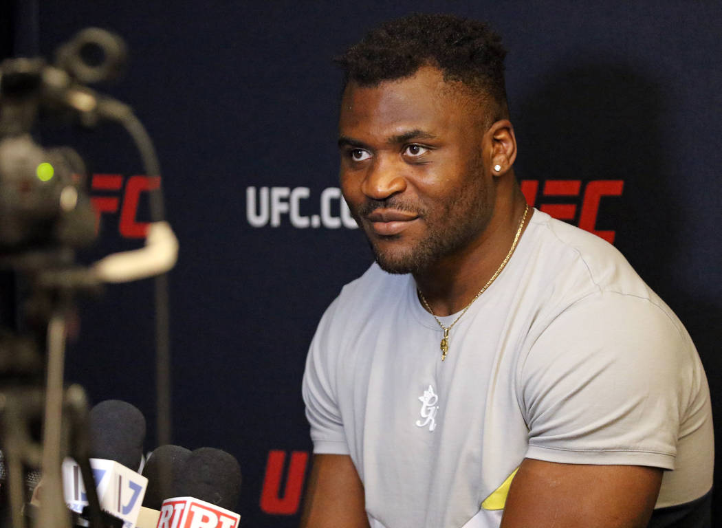 UFC heavyweight Francis Ngannou takes questions during a media scrum at the UFC Performance Ins ...