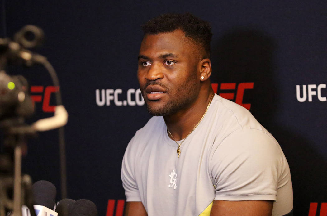 UFC heavyweight Francis Ngannou takes questions during a media scrum at the UFC Performance Ins ...
